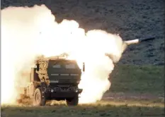  ?? Tony Overman / The Olympian file photo via AP ?? A launch truck fires the High Mobility Artillery Rocket System (HIMARS) produced by Lockheed Martin during combat training in the high desert of the Yakima Training Center on May 23, 2011, Wash. U.S. officials will send another $450 million in military aid to Ukraine, including some additional medium-range rocket systems, the latest package of which will include a number of HIMARS.