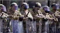  ?? AP PHOTO JACQUELYN MARTIN ?? National Guard troops stand guard Friday on Capitol Hill in Washington.