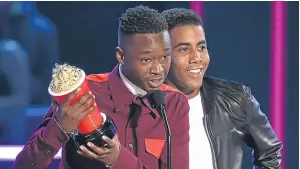  ?? Pictures: Getty/AP. ?? Clockwise from left: Emma Watson with her best actor prize; Daniel Kaluuya, who won a Next Generation award; Millie Bobby Brown, winner of Best Actor in a Show; and Ashton Sanders, left, and Jharrel Jerome accept the award for best kiss.