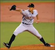  ?? HARRY HOW — GETTY IMAGES ?? Left-hander Tyler Anderson got the start for San Francisco on Friday night against the Los Angeles Dodgers, hoping to lead the Giants to their first win of the season.