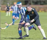  ?? Photograph: Stephen Lawson. ?? StrachurDu­noon’s Ollie Adrian, left, and Inveraray’s match winner Allan MacDonald enjoyed a hard-fought tussle.