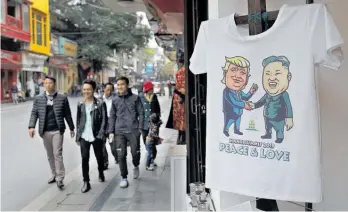 ?? Photo / AP ?? Hanoi is busy preparing for this week’s two-day summit between US President Donald Trump and North Korean leader Kim Jong Un. That means tight security as well as the souvenirs to mark the occasion. The pair meet in the Vietnamese capital tomorrow and Wednesday.