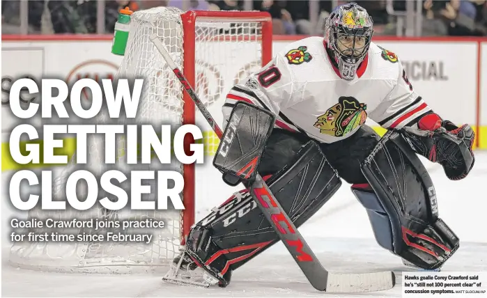  ?? MATT SLOCUM/AP ?? Hawks goalie Corey Crawford said he’s ‘‘still not 100 percent clear’’ of concussion symptoms.