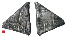  ??  ?? 11
Figure 11: Groat of Mary, folded into a triangle and deposited in the River Thames (© Hampshire Cultural Trust/ Portable Antiquitie­s Scheme, CC BY 2.0 licence)