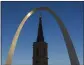  ?? PAUL J. RICHARDS — GETTY IMAGES ?? The Gateway Arch is seen over the Old Cathedral the Basilica in St. Louis on Oct. 8, 2016.