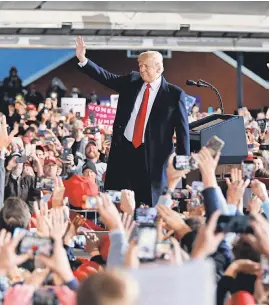  ?? SAM GREENE/USA TODAY NETWORK ?? President Donald Trump takes the stage at a Make America Great Again rally in Lebanon, Ohio, on Oct. 12.