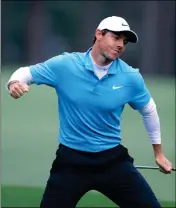  ?? ASSOCIATED PRESS ?? RORY MCLLROY celebrates his eagle on the eighth hole during the third round of the Masters golf tournament at Augusta, Ga.