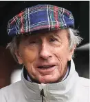  ??  ?? Tartan-clad... Sir Jackie Stewart