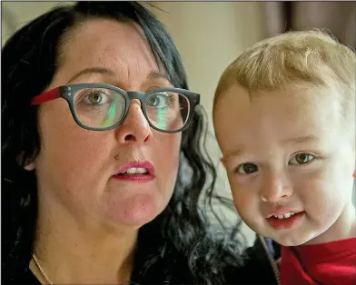  ??  ?? Under threat: Crystal MacIver, pictured with her grandson CJ, faces being deported from Scotland