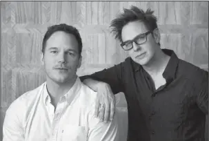  ?? The Associated Press ?? GUARDIANS AGAIN: In this April 20 photo, Chris Pratt, left, a cast member in “Guardians of the Galaxy Vol. 2,” and the film’s writer/director James Gunn pose together at the London West Hollywood Hotel in West Hollywood, Calif. The film opens Friday.