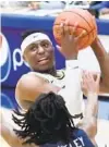  ?? AMY DAVIS/BALTIMORE SUN PHOTOS ?? “They’re tremendous athletes, they’re capable shooters who are getting better every day,” Coppin State coach Juan Dixon on Anthony, left, and Nendah Tarke.