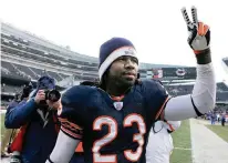  ?? CHARLES REX ARBOGAST AP ?? The Bears’ Devin Hester salutes fans after his two touchdowns lifted Chicago to a 33-25 win over the Saints at Soldier Field in 2007.