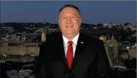  ?? (AP/Courtesy of the Committee on Arrangemen­ts for the 2020 Republican National Committee) ?? Secretary of State Mike Pompeo addresses the Republican National Convention on Tuesday from Jerusalem in a taped appearance that broke with decades of tradition of secretarie­s of state avoiding the appearance of involving themselves in domestic politics.