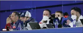  ?? BRYNN ANDERSON — THE ASSOCIATED PRESS ?? Officials from the United States’ team watch the men’s curling semifinal match between Britain and the United States at the Beijing Winter Olympics last Thursday. The British and U.S. teams employ performanc­e analysts who sit at the end of the ice sheet filming the action for match intelligen­ce. The goal: to get a better picture of each side’s strengths and weaknesses — informatio­n that can be relayed to players during breaks.