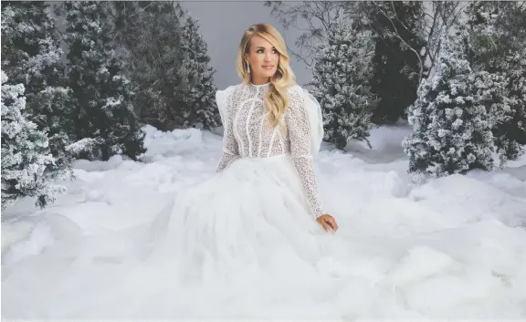  ?? UNIVERSAL MUSIC ?? Country singer-songwriter Carrie Underwood says she loves the fact that there were “no rules” to follow when she chose to record an album of Christmas music.
