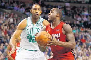  ?? MADDIE MEYER/GETTY IMAGES ?? Dion Waiters, here against the Celtics last week, tweaked his troublesom­e ankle again in the loss to the Pelicans on the weekend.