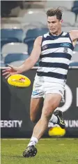  ??  ?? Geelong’s Tom Hawkins kicks a goal.