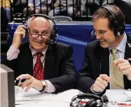  ?? Michael Conroy/Associated Press ?? CBS announcers Billy Packer, left, and Jim Nantz laugh during a break in the 2006 Big Ten tournament. Packer, an Emmy award-winning college basketball broadcaste­r who covered 34 Final Fours for NBC and CBS, died Thursday night at 82.
