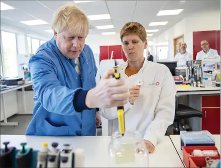  ??  ?? Prime Minister Boris Johnson at the Mologic Laboratory in Bedford technology Park, where he announced £46 million for developing testing kits