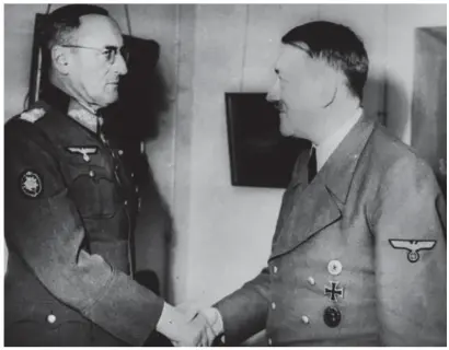  ?? ?? Final days: One of the last pictures taken of Adolf Hitler, with Field Marshal Ferdinand Schoerner, in his bunker in Berlin in 1945