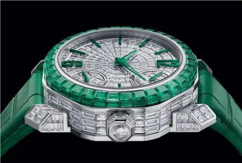  ?? ?? This and facing pages: the Octo Roma Grande Sonnerie watch in 18-carat white gold with a green alligator bracelet magnificen­tly fuses haute horlogerie with high jewellery.