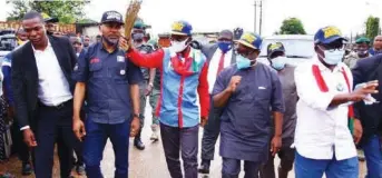  ??  ?? The candidate of All Progressiv­es Congress (APC) for Lagos East senatorial by-election, Tokunbo Abiru flanked by Chairman of Ijede LCDA, Salisu Jimoh (left); Chairman of the APC Senatorial Campaign Council, Kaoli Olusanya (first right) during a street march in Ijede LCDA ahead of the October 31 senatorial by-election in Lagos East … on Tuesday