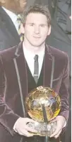  ?? AFP PHOTO ?? Barcelona’s Argentinia­n forward Lionel Messi poses after receiving for the third time the FIFA Ballon d’or award on Monday at the Kongressha­us during the FIFA Ballon d’or ceremony in Zurich.