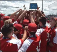  ?? MEDIANEWS GROUP FILE PHOTO ?? Souderton High School players hold up the PIAA 5A State Championsh­ip trophy after defeating Central Bucks South last season.