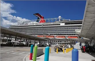  ?? JEAN/SOUTH FLORIDA SUN-SENTINEL/TNS CARLINE ?? Cruise lines such as Carnival Cruise Line, which operates the Carnival Horizon shown here in 2018, and their customers, are beginning to see coronaviru­s cases on ships as inevitable, even acceptable.