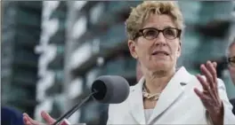  ?? CHRISTOPHE­R KATSAROV, THE CANADIAN PRESS FILE PHOTO ?? Wynne: “The reality is the whole world needs to be involved in fighting climate change.”