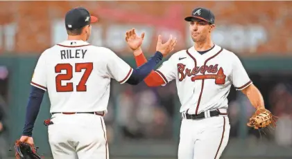  ?? DALE ZANINE/USA TODAY SPORTS ?? Austin Riley and Matt Olson lead Atlanta in their quest for a seventh consecutiv­e division title.