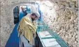  ?? AFP ?? A Pakistani Muslim visits a tunnel where the ancient copies of the Koran are preserved in Jabl-e-Noor, Quetta.