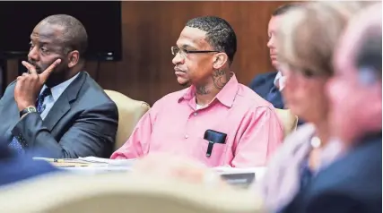  ?? BRAD VEST/THE COMMERCIAL APPEAL ?? Quinton Tellis, center, sits in court Tuesday on the first day of his retrial in Batesville, Mississipp­i. Tellis is charged with burning 19-year-old Jessica Chambers to death in 2014.
