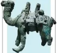  ?? PHOTOS BY WANG KAIHAO AND PROVIDED TO CHINA DAILY ?? From top: Key exhibits unearthed from AlUla include: a DadaniticA­ramaic bilingual inscriptio­n, a statuette of a goat, an incense burner, a stone relief of ibexes, a constructi­on item, a bronze camel statuette.