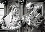  ?? AJC ?? Prince Charles draws applause from Gov. George Busbee and Lt. Gov. Zell Miller at the State Capitol in October 1977. Miller served a 16-year run as the state’s lieutenant governor.