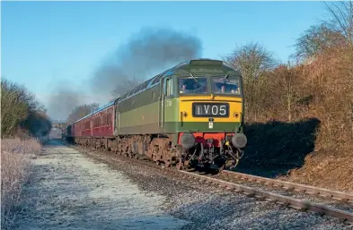  ?? Tom Mcatee ?? With a layer of frost on the ground and in a scene that could be from the 1960s, D1501 hauls a rake of maroon Mk.1 coaches climbing Broadfield Bank, between Bury and Heywood on the East Lancashire Railway, on February 7, 2020.