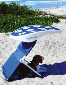  ??  ?? The ShadyPaws Portable Pet Canopy Sunshade retails at US$90.00 (S$119.80) and is available in Jockey Red and Captain Navy. Shipping is free. Find out more at shadyface.com.