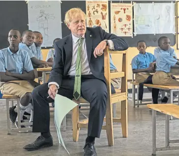  ?? ?? Boris Johnson at a school in Kigali, Rwanda last week