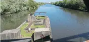  ?? ?? Brindley’s Aqueduct was replaced by the Barton Swing Aqueduct in 1893.