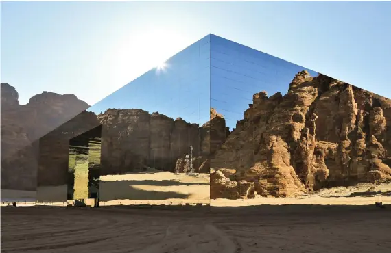  ?? Supplied ?? The record of the largest mirrored building — covered by 9,740 square meters — was achieved by the Royal Commission for AlUla on Dec. 26, 2019. This is almost the size of a football pitch.