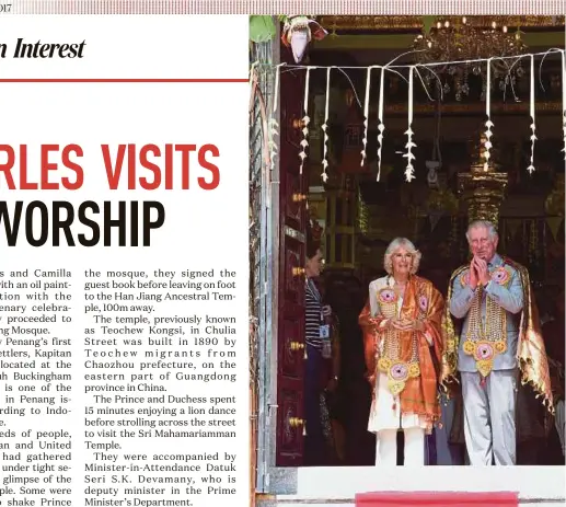  ?? BERNAMA PIC ?? Prince Charles and his wife, Camilla, at the Sri Mahamariam­man Temple in Queen Street, George Town, yesterday.