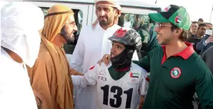  ?? Supplied photo ?? Sheikh Mohammed bin Rashid and Sheikh Mansour with the winning jockey. —