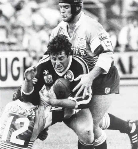  ??  ?? Chris Close is tackled by Greg Conescu as Keith Gee goes over the top in a Giants-Broncos clash in 1988; Close famously gives NSW the bird after Game One of the 2005 Origin series; and enjoying a coffee on the Coast in more recent times.