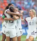  ?? Ap-david Vincent ?? US players celebrate at the end of the match at the Stade de Lyon in Decines, outside Lyon, France, on Sunday. US won 2-0.