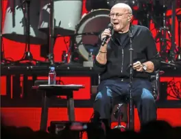  ?? Alexandra Wimley/Post-Gazette ?? Phil Collins performs at PPG Paints Arena last October.