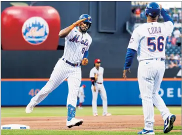  ?? Corey Sipkin ?? POWER TRIP: Starling Marte, who went 2-for-4 with two RBIs and a stolen base, salutes Joey Cora while rounding the bases after hitting a two-run home run in the first inning.