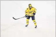  ?? Scott W. Grau / Icon Sportswire via Getty Images ?? Michigan’s Mackie Samoskevic­h skates against Ohio State during a men’s hockey game on Feb. 19 in Ann Arbor, Mich.