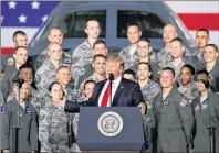  ?? AP PHOTO ?? President Donald Trump speaks to military personnel and their families at Andrews Air Force Base, Md., Friday.