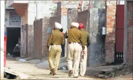  ?? HT PHOTO ?? Policemen taking a round of Verka locality in Amritsar on Sunday.