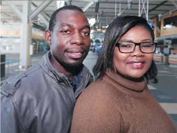  ?? DERRICK PENNER ?? Remy Kasongo Mutambayi and his wife Pamela Zenda arrived in Canada on July 20 from Zimbabwe with the help of the Community Airport Newcomers Network, a service of Canada’s settlement process at YVR operated by the community service group SUCCESS.